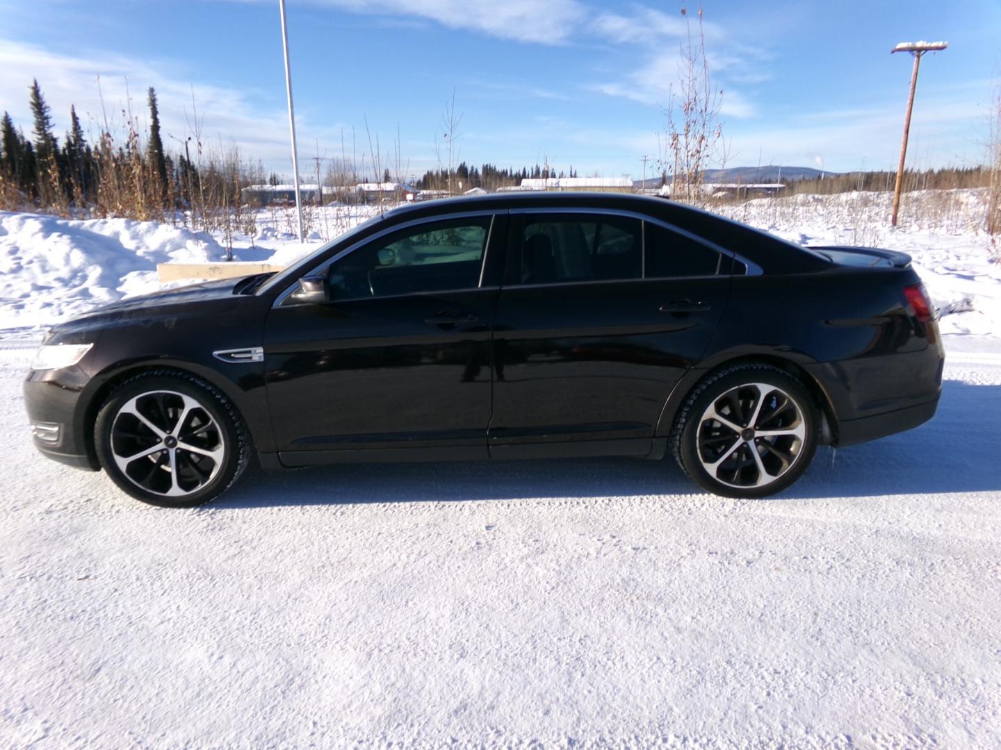 2014 Brown Ford Taurus SEL (1FAHP2H85EG) with an 3.5L V6 DOHC 24V engine, 6-Speed Automatic transmission, located at 2630 Philips Field Rd., Fairbanks, AK, 99709, (907) 458-0593, 64.848068, -147.780609 - Photo#2